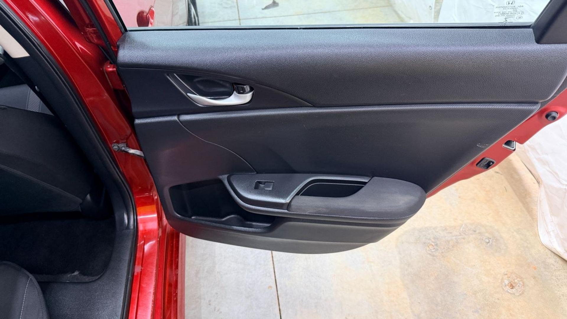 2021 Red Honda Civic Sedan LX (2HGFC2F64MH) with an 2L I-4 DOHC engine, located at 1806 Veterans Memorial Hwy SW, Austell, GA, 30168, (770) 944-9558, 33.817959, -84.606987 - This Honda is in great condition, with paint that looks good and tires that look clean and brand new. Inside, the interior looks impeccable. A reliable, fuel-efficient compact that's ready for daily driving.- Photo#15