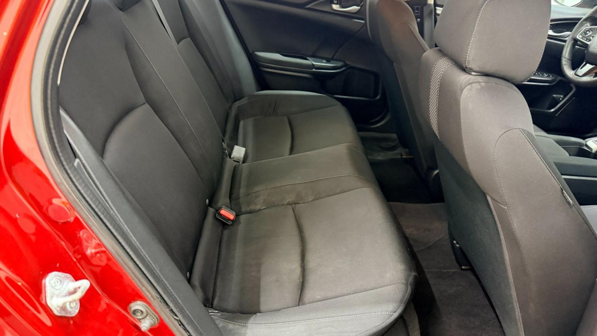 2021 Red Honda Civic Sedan LX (2HGFC2F64MH) with an 2L I-4 DOHC engine, located at 1806 Veterans Memorial Hwy SW, Austell, GA, 30168, (770) 944-9558, 33.817959, -84.606987 - This Honda is in great condition, with paint that looks good and tires that look clean and brand new. Inside, the interior looks impeccable. A reliable, fuel-efficient compact that's ready for daily driving.- Photo#16