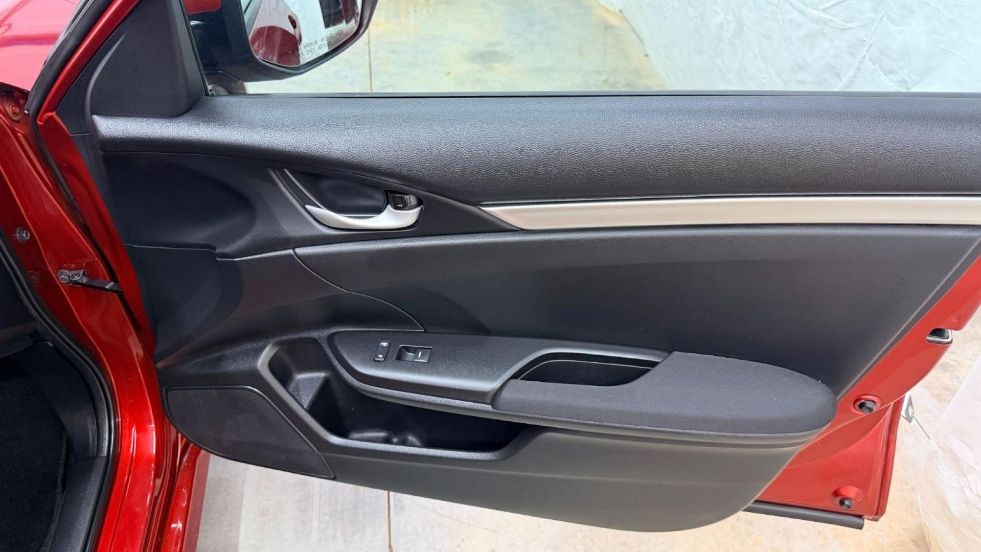 2021 Red Honda Civic Sedan LX (2HGFC2F64MH) with an 2L I-4 DOHC engine, located at 1806 Veterans Memorial Hwy SW, Austell, GA, 30168, (770) 944-9558, 33.817959, -84.606987 - This Honda is in great condition, with paint that looks good and tires that look clean and brand new. Inside, the interior looks impeccable. A reliable, fuel-efficient compact that's ready for daily driving.- Photo#17