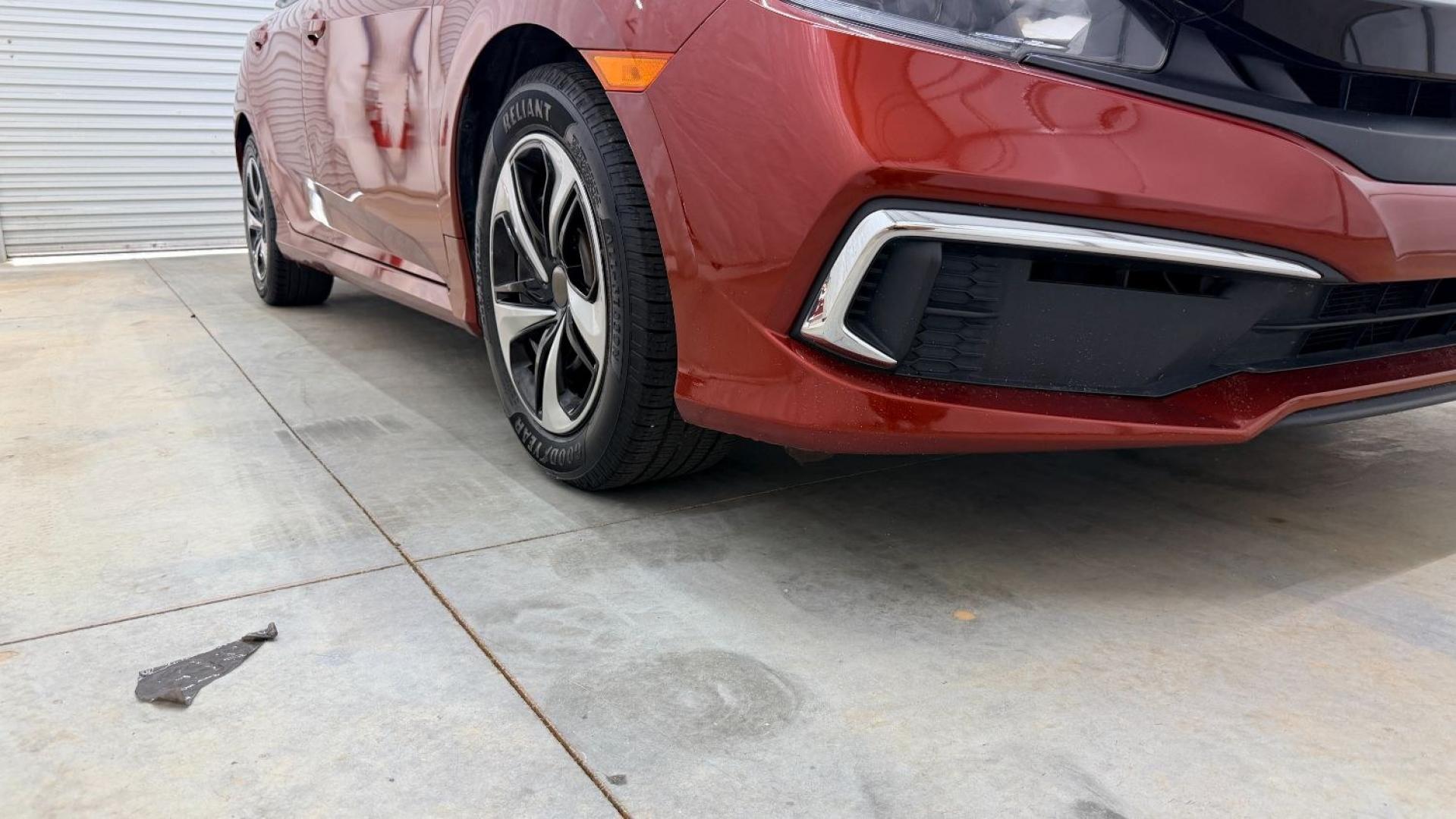 2021 Red Honda Civic Sedan LX (2HGFC2F64MH) with an 2L I-4 DOHC engine, located at 1806 Veterans Memorial Hwy SW, Austell, GA, 30168, (770) 944-9558, 33.817959, -84.606987 - This Honda is in great condition, with paint that looks good and tires that look clean and brand new. Inside, the interior looks impeccable. A reliable, fuel-efficient compact that's ready for daily driving.- Photo#19