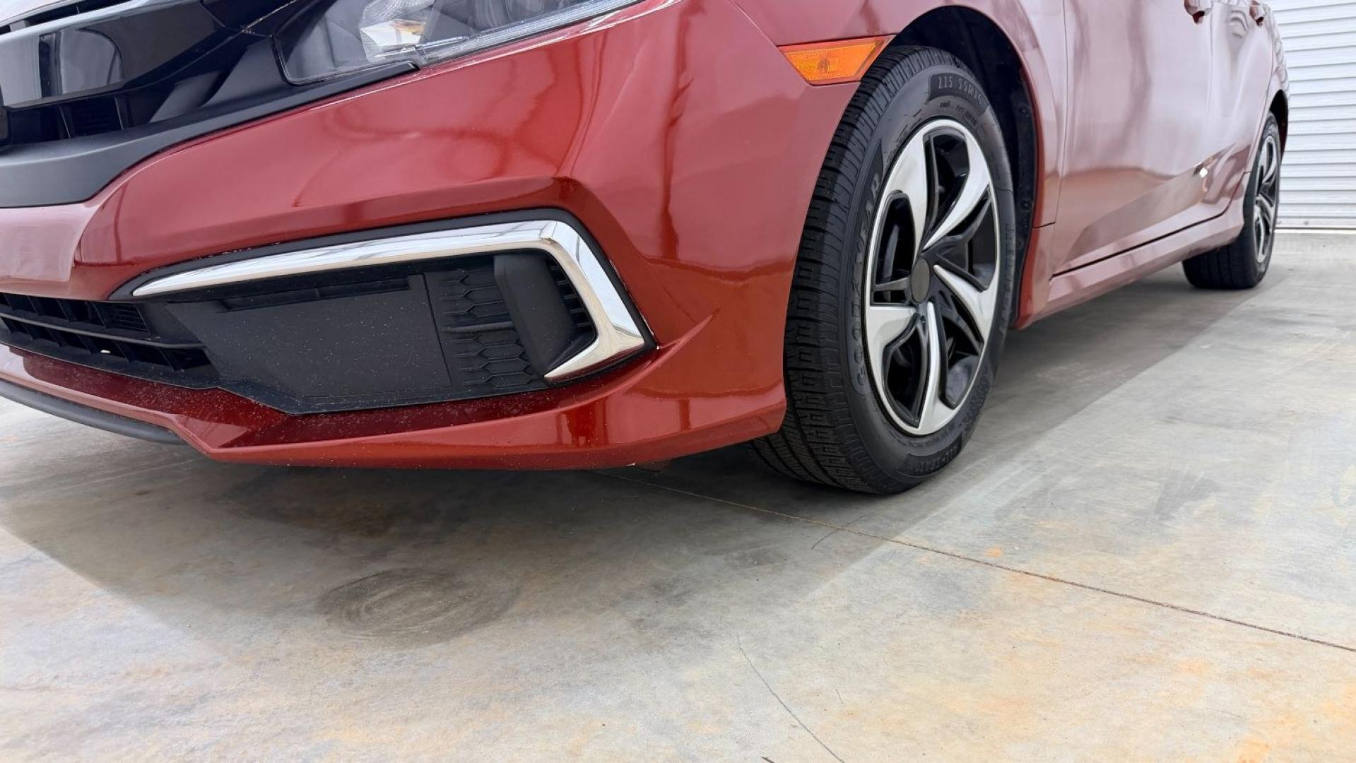 2021 Red Honda Civic Sedan LX (2HGFC2F64MH) with an 2L I-4 DOHC engine, located at 1806 Veterans Memorial Hwy SW, Austell, GA, 30168, (770) 944-9558, 33.817959, -84.606987 - This Honda is in great condition, with paint that looks good and tires that look clean and brand new. Inside, the interior looks impeccable. A reliable, fuel-efficient compact that's ready for daily driving.- Photo#20