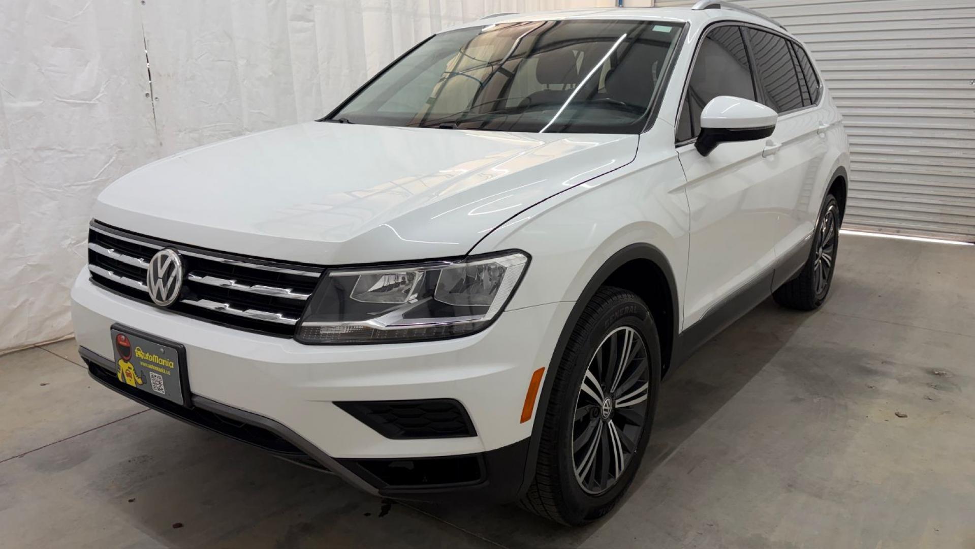 2018 White Volkswagen Tiguan 2.0T SEL | 2.0T SE (3VV2B7AX5JM) with an 2L I-4 direct injection engine, located at 1806 Veterans Memorial Hwy SW, Austell, GA, 30168, (770) 944-9558, 33.817959, -84.606987 - This 2018 Volkswagen Tiguan SEL has passed a 100+ point inspection performed in our own service center. It's in like-new condition and even smells like new, with no blemishes inside or out to describe. It also has new tires. Come see it in person and take it for a test drive! Why Choose Automania?- Photo#0
