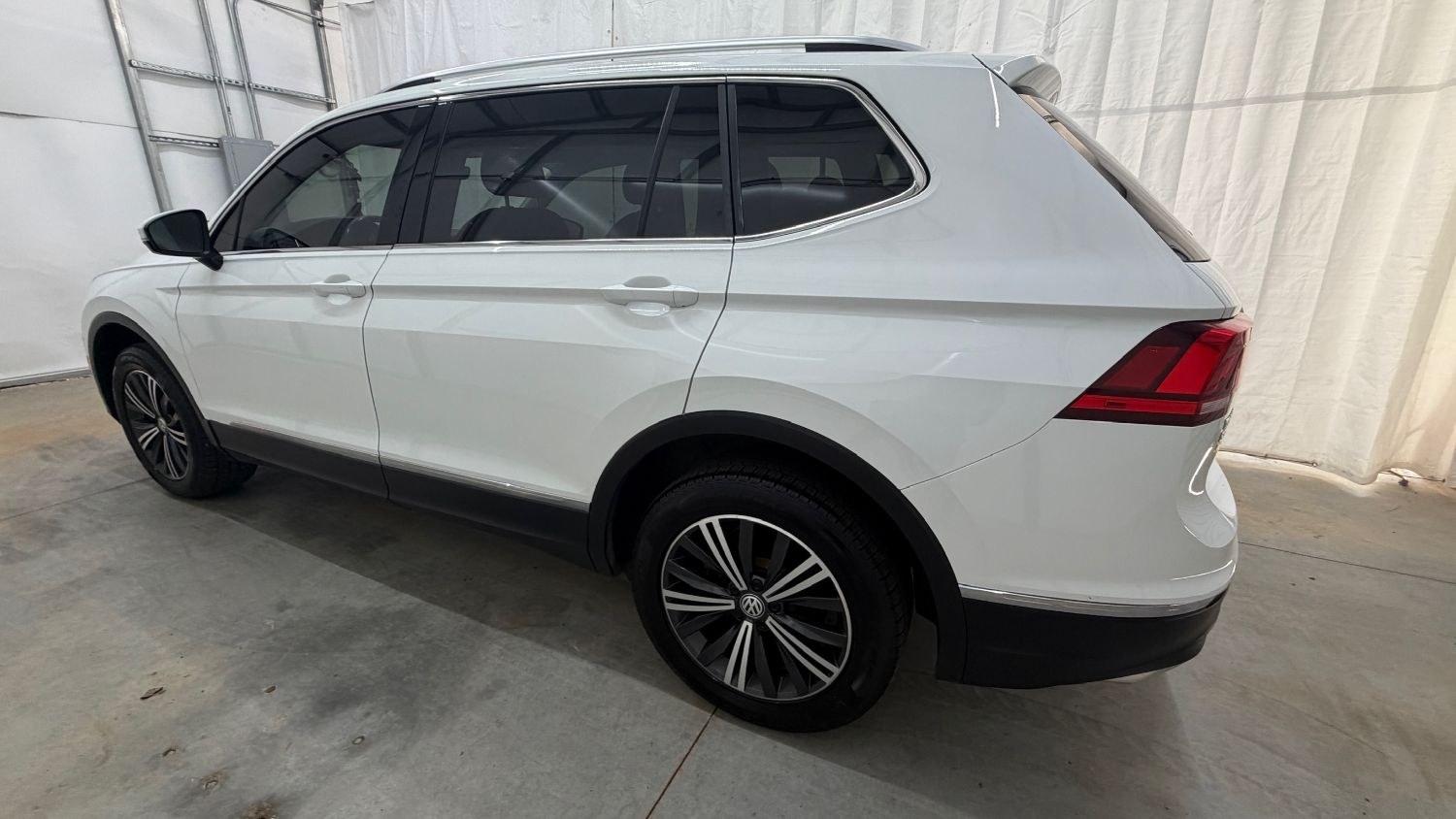 2018 White Volkswagen Tiguan 2.0T SEL | 2.0T SE (3VV2B7AX5JM) with an 2L I-4 direct injection engine, located at 1806 Veterans Memorial Hwy SW, Austell, GA, 30168, (770) 944-9558, 33.817959, -84.606987 - This 2018 Volkswagen Tiguan SEL has passed a 100+ point inspection performed in our own service center. It's in like-new condition and even smells like new, with no blemishes inside or out to describe. It also has new tires. Come see it in person and take it for a test drive! Why Choose Automania?- Photo#2