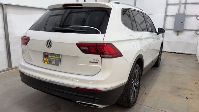 2018 White Volkswagen Tiguan 2.0T SEL | 2.0T SE (3VV2B7AX5JM) with an 2L I-4 direct injection engine, located at 1806 Veterans Memorial Hwy SW, Austell, GA, 30168, (770) 944-9558, 33.817959, -84.606987 - This 2018 Volkswagen Tiguan SEL has passed a 100+ point inspection performed in our own service center. It's in like-new condition and even smells like new, with no blemishes inside or out to describe. It also has new tires. Come see it in person and take it for a test drive! Why Choose Automania?- Photo#5