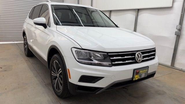 2018 White Volkswagen Tiguan 2.0T SEL | 2.0T SE (3VV2B7AX5JM) with an 2L I-4 direct injection engine, located at 1806 Veterans Memorial Hwy SW, Austell, GA, 30168, (770) 944-9558, 33.817959, -84.606987 - This 2018 Volkswagen Tiguan SEL has passed a 100+ point inspection performed in our own service center. It's in like-new condition and even smells like new, with no blemishes inside or out to describe. It also has new tires. Come see it in person and take it for a test drive! Why Choose Automania?- Photo#8