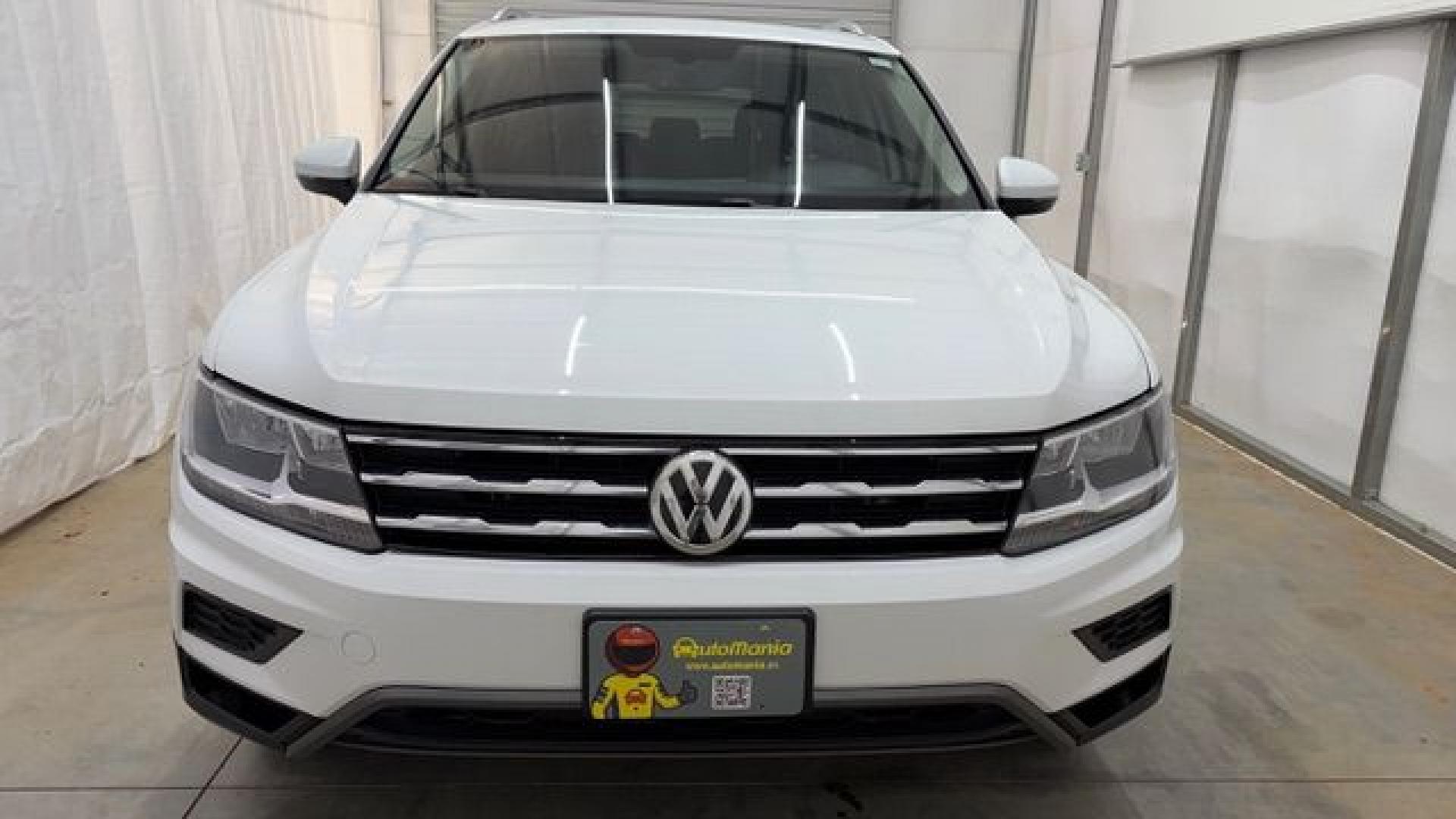2018 White Volkswagen Tiguan 2.0T SEL | 2.0T SE (3VV2B7AX5JM) with an 2L I-4 direct injection engine, located at 1806 Veterans Memorial Hwy SW, Austell, GA, 30168, (770) 944-9558, 33.817959, -84.606987 - This 2018 Volkswagen Tiguan SEL has passed a 100+ point inspection performed in our own service center. It's in like-new condition and even smells like new, with no blemishes inside or out to describe. It also has new tires. Come see it in person and take it for a test drive! Why Choose Automania?- Photo#9