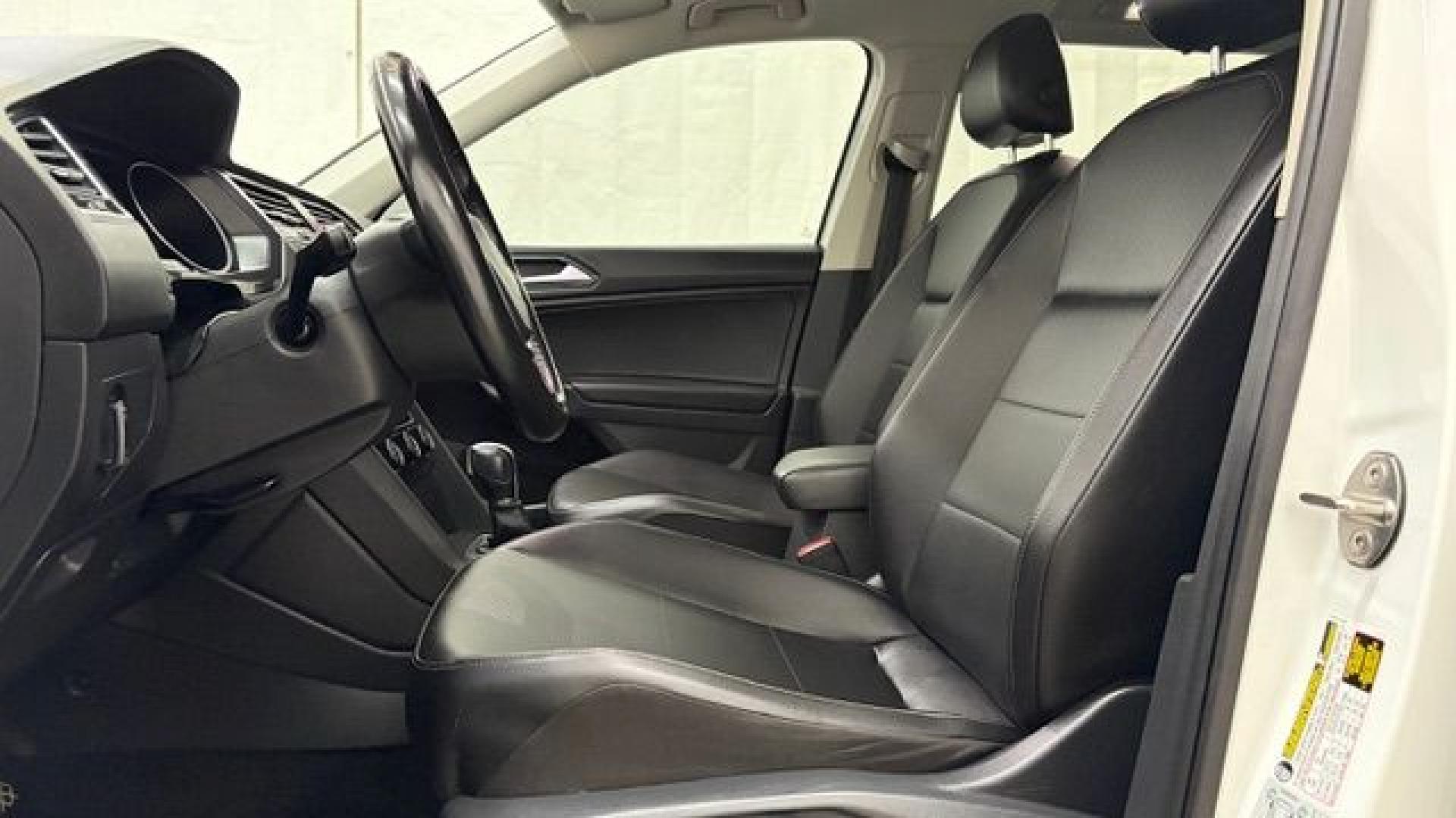 2018 White Volkswagen Tiguan 2.0T SEL | 2.0T SE (3VV2B7AX5JM) with an 2L I-4 direct injection engine, located at 1806 Veterans Memorial Hwy SW, Austell, GA, 30168, (770) 944-9558, 33.817959, -84.606987 - This 2018 Volkswagen Tiguan SEL has passed a 100+ point inspection performed in our own service center. It's in like-new condition and even smells like new, with no blemishes inside or out to describe. It also has new tires. Come see it in person and take it for a test drive! Why Choose Automania?- Photo#11