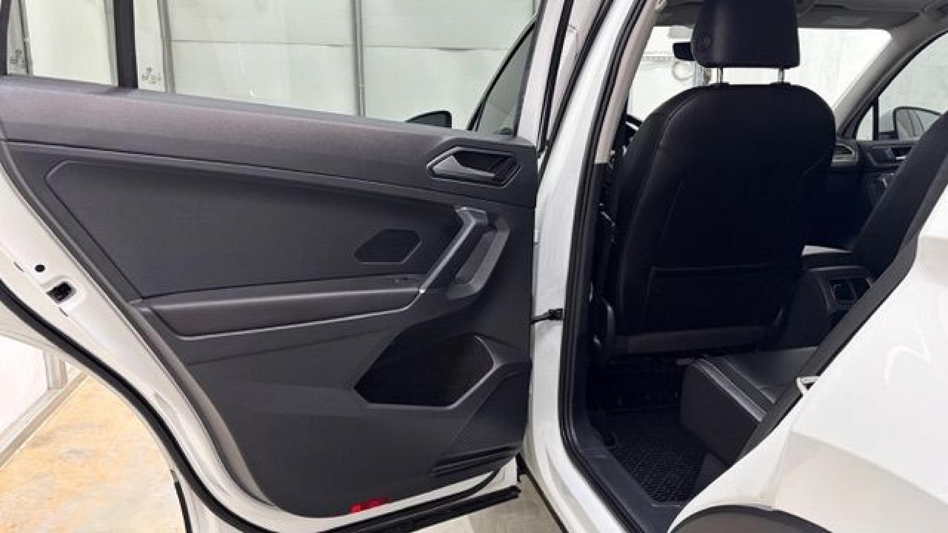 2018 White Volkswagen Tiguan 2.0T SEL | 2.0T SE (3VV2B7AX5JM) with an 2L I-4 direct injection engine, located at 1806 Veterans Memorial Hwy SW, Austell, GA, 30168, (770) 944-9558, 33.817959, -84.606987 - This 2018 Volkswagen Tiguan SEL has passed a 100+ point inspection performed in our own service center. It's in like-new condition and even smells like new, with no blemishes inside or out to describe. It also has new tires. Come see it in person and take it for a test drive! Why Choose Automania?- Photo#13