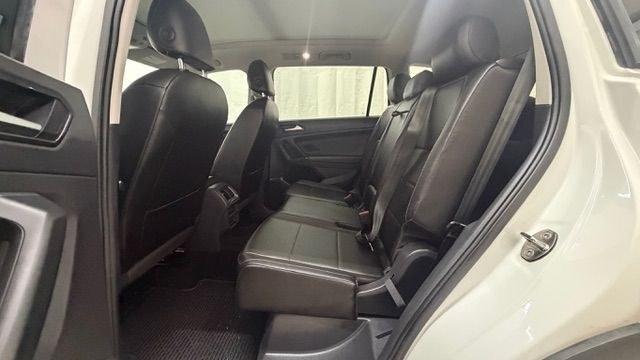 2018 White Volkswagen Tiguan 2.0T SEL | 2.0T SE (3VV2B7AX5JM) with an 2L I-4 direct injection engine, located at 1806 Veterans Memorial Hwy SW, Austell, GA, 30168, (770) 944-9558, 33.817959, -84.606987 - This 2018 Volkswagen Tiguan SEL has passed a 100+ point inspection performed in our own service center. It's in like-new condition and even smells like new, with no blemishes inside or out to describe. It also has new tires. Come see it in person and take it for a test drive! Why Choose Automania?- Photo#14