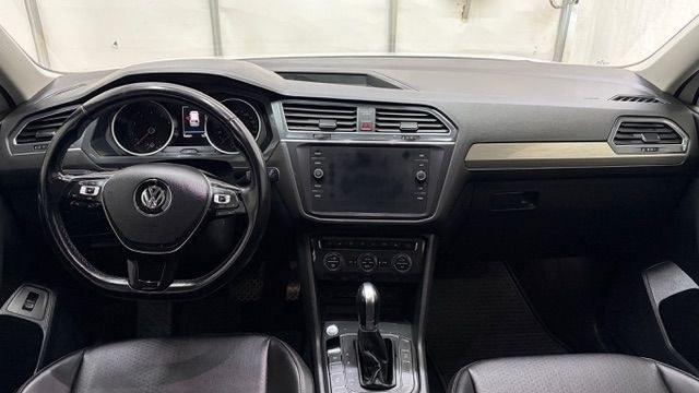 2018 White Volkswagen Tiguan 2.0T SEL | 2.0T SE (3VV2B7AX5JM) with an 2L I-4 direct injection engine, located at 1806 Veterans Memorial Hwy SW, Austell, GA, 30168, (770) 944-9558, 33.817959, -84.606987 - This 2018 Volkswagen Tiguan SEL has passed a 100+ point inspection performed in our own service center. It's in like-new condition and even smells like new, with no blemishes inside or out to describe. It also has new tires. Come see it in person and take it for a test drive! Why Choose Automania?- Photo#15