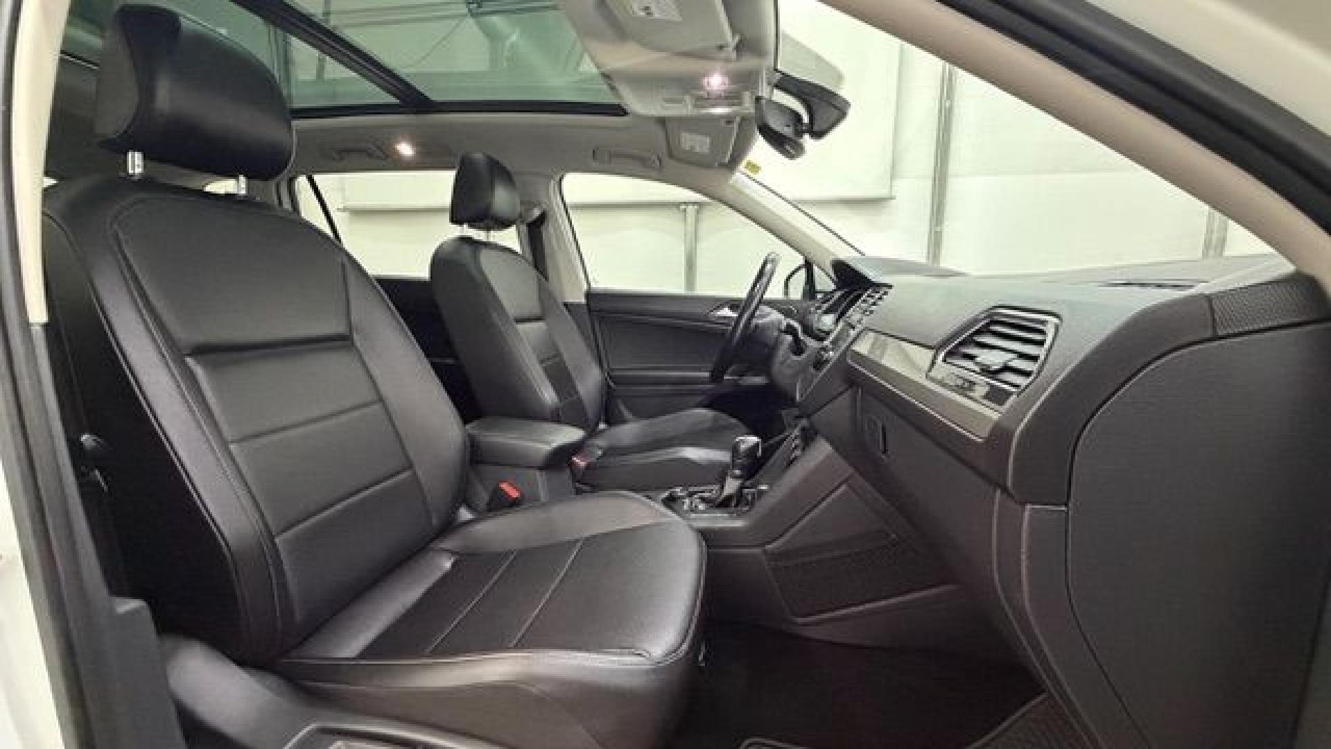 2018 White Volkswagen Tiguan 2.0T SEL | 2.0T SE (3VV2B7AX5JM) with an 2L I-4 direct injection engine, located at 1806 Veterans Memorial Hwy SW, Austell, GA, 30168, (770) 944-9558, 33.817959, -84.606987 - This 2018 Volkswagen Tiguan SEL has passed a 100+ point inspection performed in our own service center. It's in like-new condition and even smells like new, with no blemishes inside or out to describe. It also has new tires. Come see it in person and take it for a test drive! Why Choose Automania?- Photo#18
