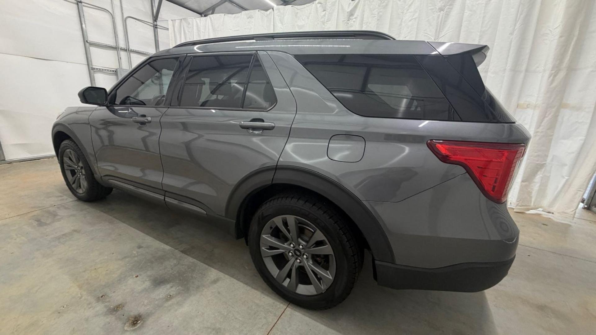 2021 Gray Ford Explorer XLT (1FMSK8DHXMG) with an EcoBoost 2.3L I-4 direct injection engine, located at 1806 Veterans Memorial Hwy SW, Austell, GA, 30168, (770) 944-9558, 33.817959, -84.606987 - This Explorer has an interior that looks good and comes from a non-smoker vehicle. The exterior paint looks excellent, with only minor scratches, and the tires are in great shape. With lots of comfortable seating, it's a spacious, family-friendly SUV that's ready for daily driving.- Photo#2