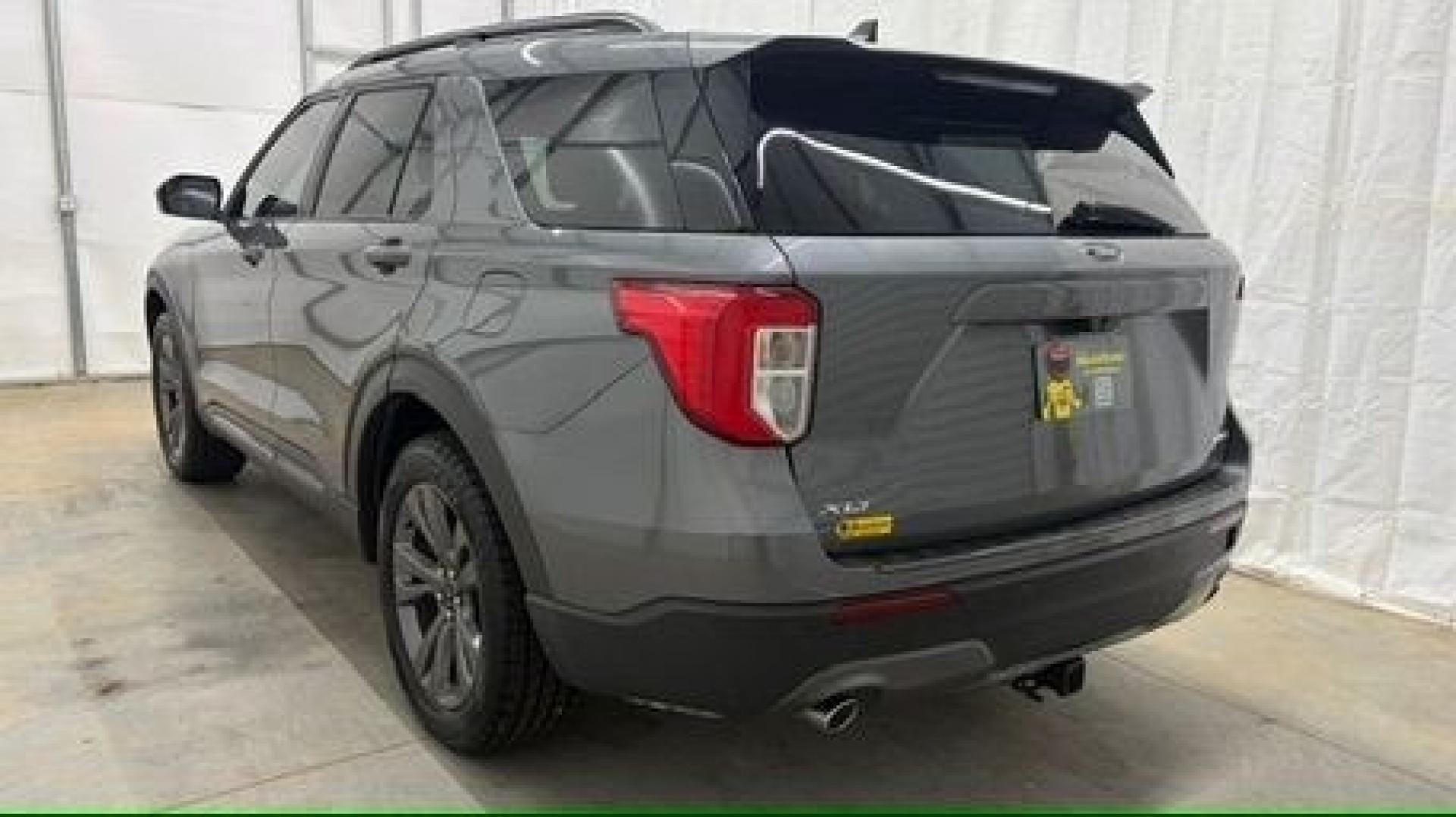 2021 Gray Ford Explorer XLT (1FMSK8DHXMG) with an EcoBoost 2.3L I-4 direct injection engine, located at 1806 Veterans Memorial Hwy SW, Austell, GA, 30168, (770) 944-9558, 33.817959, -84.606987 - This Explorer has an interior that looks good and comes from a non-smoker vehicle. The exterior paint looks excellent, with only minor scratches, and the tires are in great shape. With lots of comfortable seating, it's a spacious, family-friendly SUV that's ready for daily driving.- Photo#3