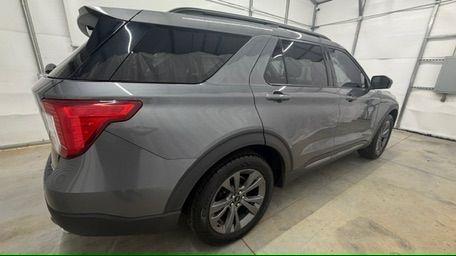 2021 Gray Ford Explorer XLT (1FMSK8DHXMG) with an EcoBoost 2.3L I-4 direct injection engine, located at 1806 Veterans Memorial Hwy SW, Austell, GA, 30168, (770) 944-9558, 33.817959, -84.606987 - This Explorer has an interior that looks good and comes from a non-smoker vehicle. The exterior paint looks excellent, with only minor scratches, and the tires are in great shape. With lots of comfortable seating, it's a spacious, family-friendly SUV that's ready for daily driving.- Photo#6