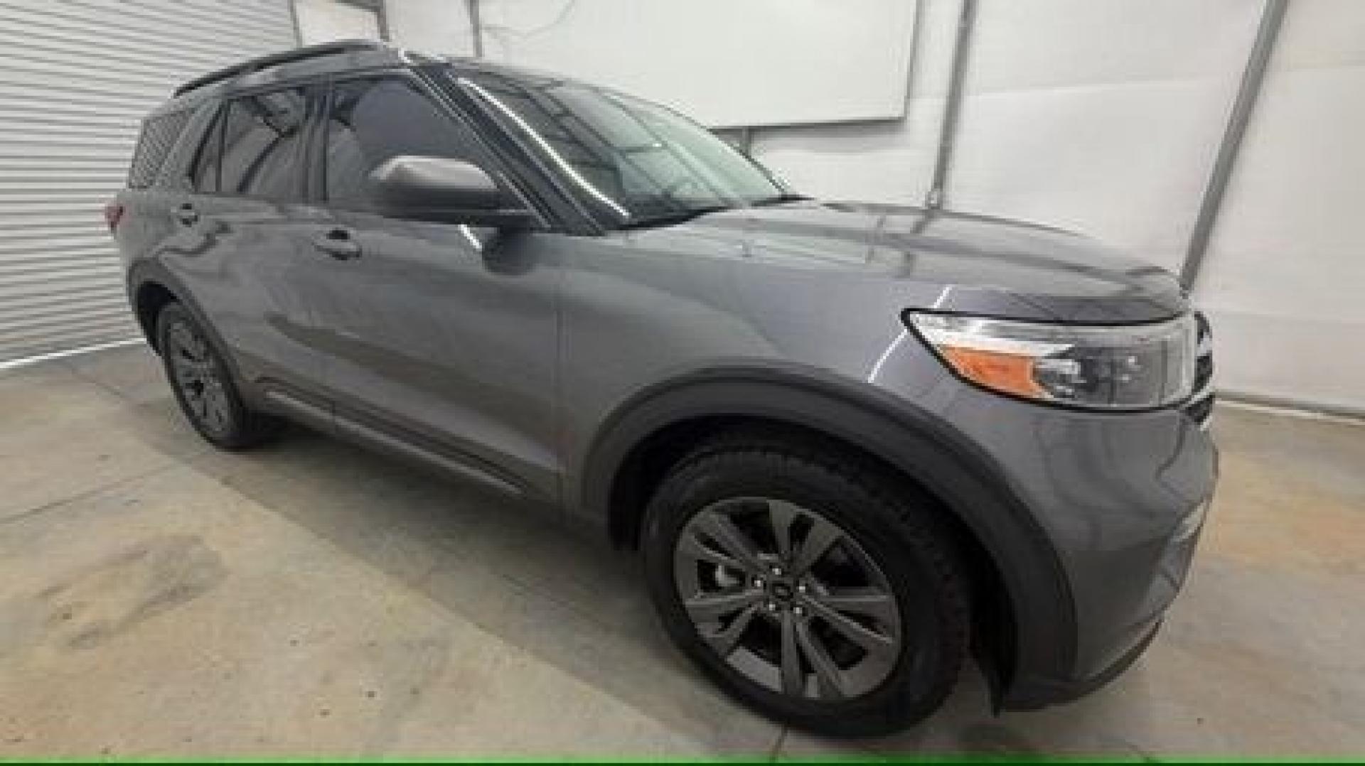 2021 Gray Ford Explorer XLT (1FMSK8DHXMG) with an EcoBoost 2.3L I-4 direct injection engine, located at 1806 Veterans Memorial Hwy SW, Austell, GA, 30168, (770) 944-9558, 33.817959, -84.606987 - This Explorer has an interior that looks good and comes from a non-smoker vehicle. The exterior paint looks excellent, with only minor scratches, and the tires are in great shape. With lots of comfortable seating, it's a spacious, family-friendly SUV that's ready for daily driving.- Photo#7