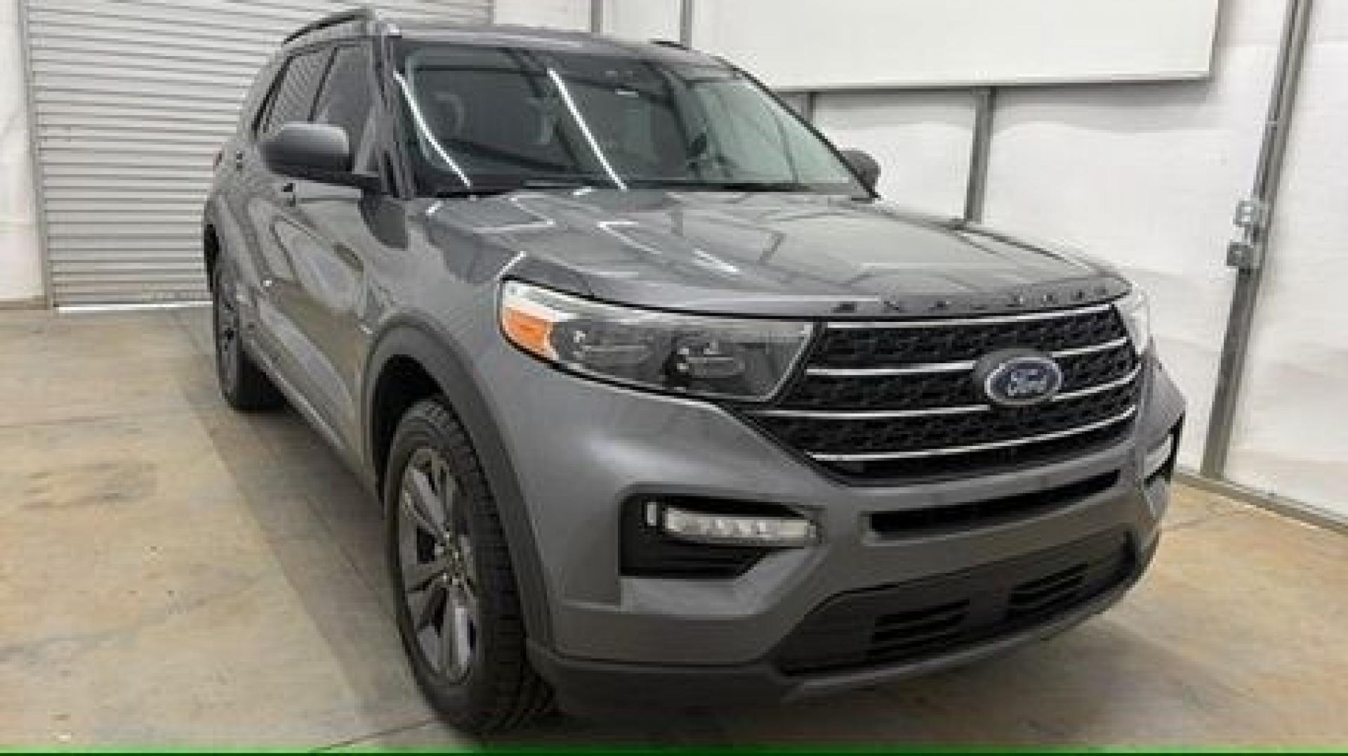 2021 Gray Ford Explorer XLT (1FMSK8DHXMG) with an EcoBoost 2.3L I-4 direct injection engine, located at 1806 Veterans Memorial Hwy SW, Austell, GA, 30168, (770) 944-9558, 33.817959, -84.606987 - This Explorer has an interior that looks good and comes from a non-smoker vehicle. The exterior paint looks excellent, with only minor scratches, and the tires are in great shape. With lots of comfortable seating, it's a spacious, family-friendly SUV that's ready for daily driving.- Photo#8