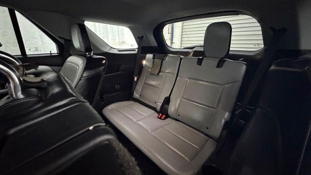 2021 Gray Ford Explorer XLT (1FMSK8DHXMG) with an EcoBoost 2.3L I-4 direct injection engine, located at 1806 Veterans Memorial Hwy SW, Austell, GA, 30168, (770) 944-9558, 33.817959, -84.606987 - This Explorer has an interior that looks good and comes from a non-smoker vehicle. The exterior paint looks excellent, with only minor scratches, and the tires are in great shape. With lots of comfortable seating, it's a spacious, family-friendly SUV that's ready for daily driving.- Photo#16