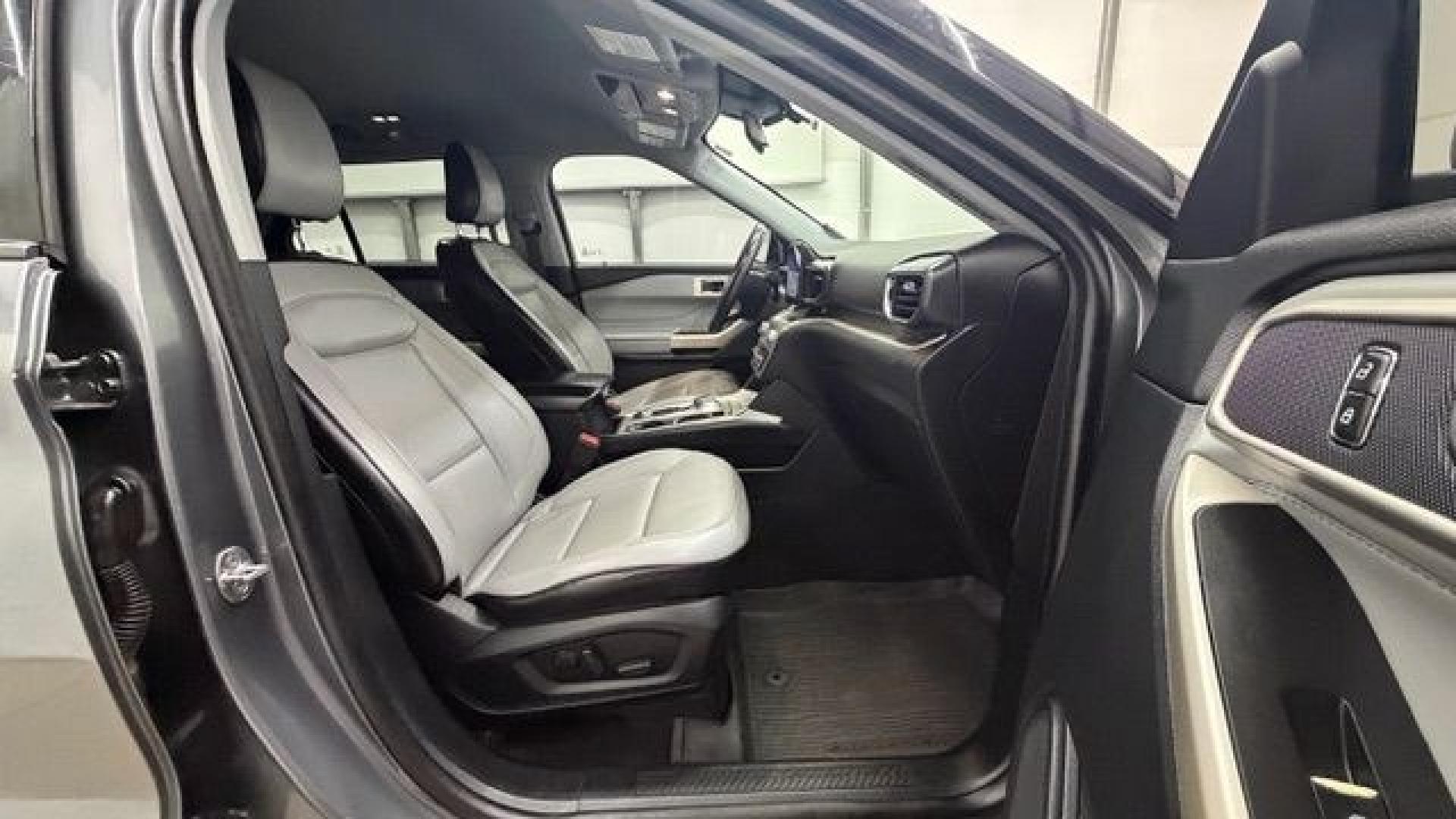 2021 Gray Ford Explorer XLT (1FMSK8DHXMG) with an EcoBoost 2.3L I-4 direct injection engine, located at 1806 Veterans Memorial Hwy SW, Austell, GA, 30168, (770) 944-9558, 33.817959, -84.606987 - This Explorer has an interior that looks good and comes from a non-smoker vehicle. The exterior paint looks excellent, with only minor scratches, and the tires are in great shape. With lots of comfortable seating, it's a spacious, family-friendly SUV that's ready for daily driving.- Photo#20