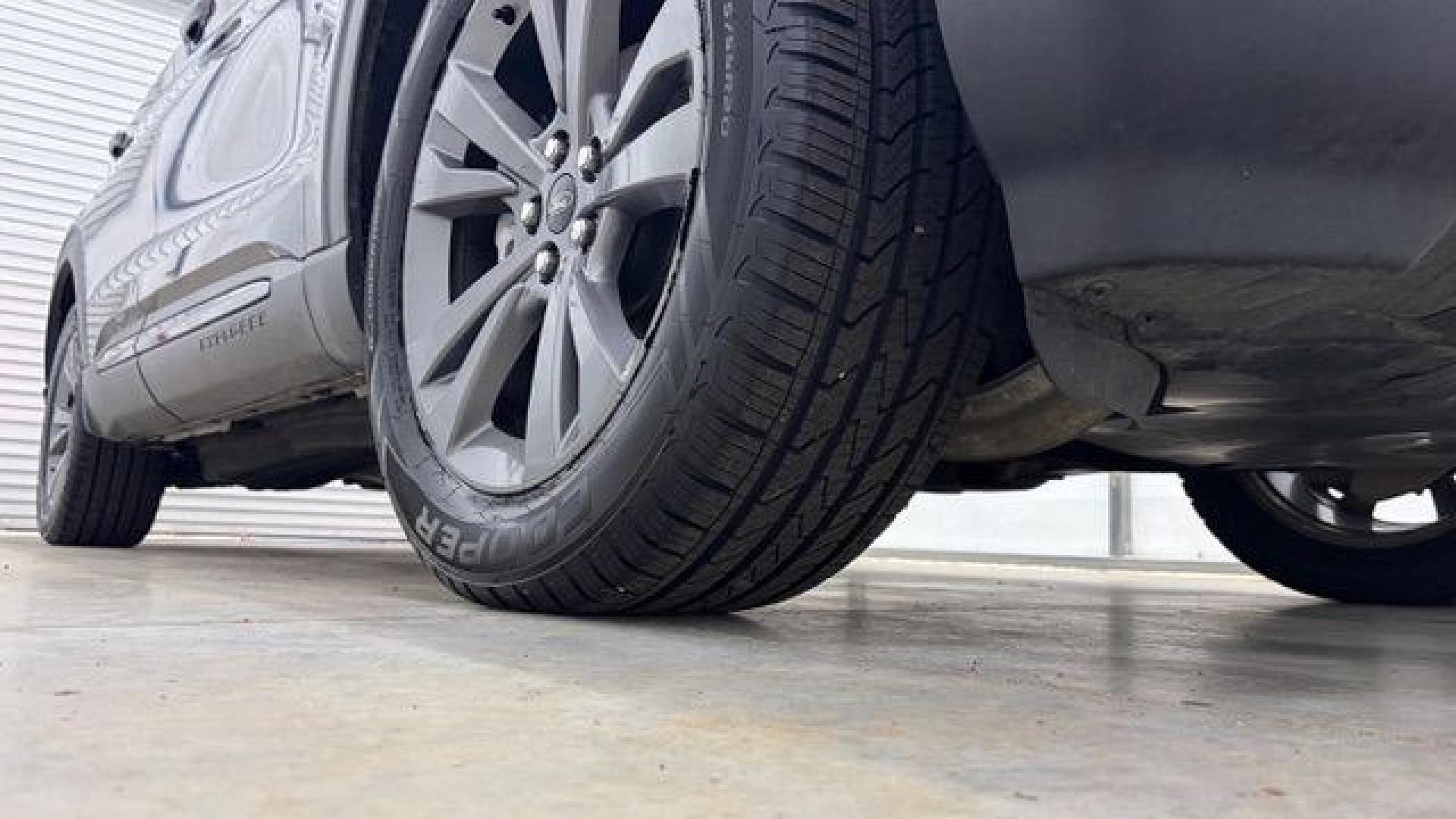 2021 Gray Ford Explorer XLT (1FMSK8DHXMG) with an EcoBoost 2.3L I-4 direct injection engine, located at 1806 Veterans Memorial Hwy SW, Austell, GA, 30168, (770) 944-9558, 33.817959, -84.606987 - This Explorer has an interior that looks good and comes from a non-smoker vehicle. The exterior paint looks excellent, with only minor scratches, and the tires are in great shape. With lots of comfortable seating, it's a spacious, family-friendly SUV that's ready for daily driving.- Photo#21