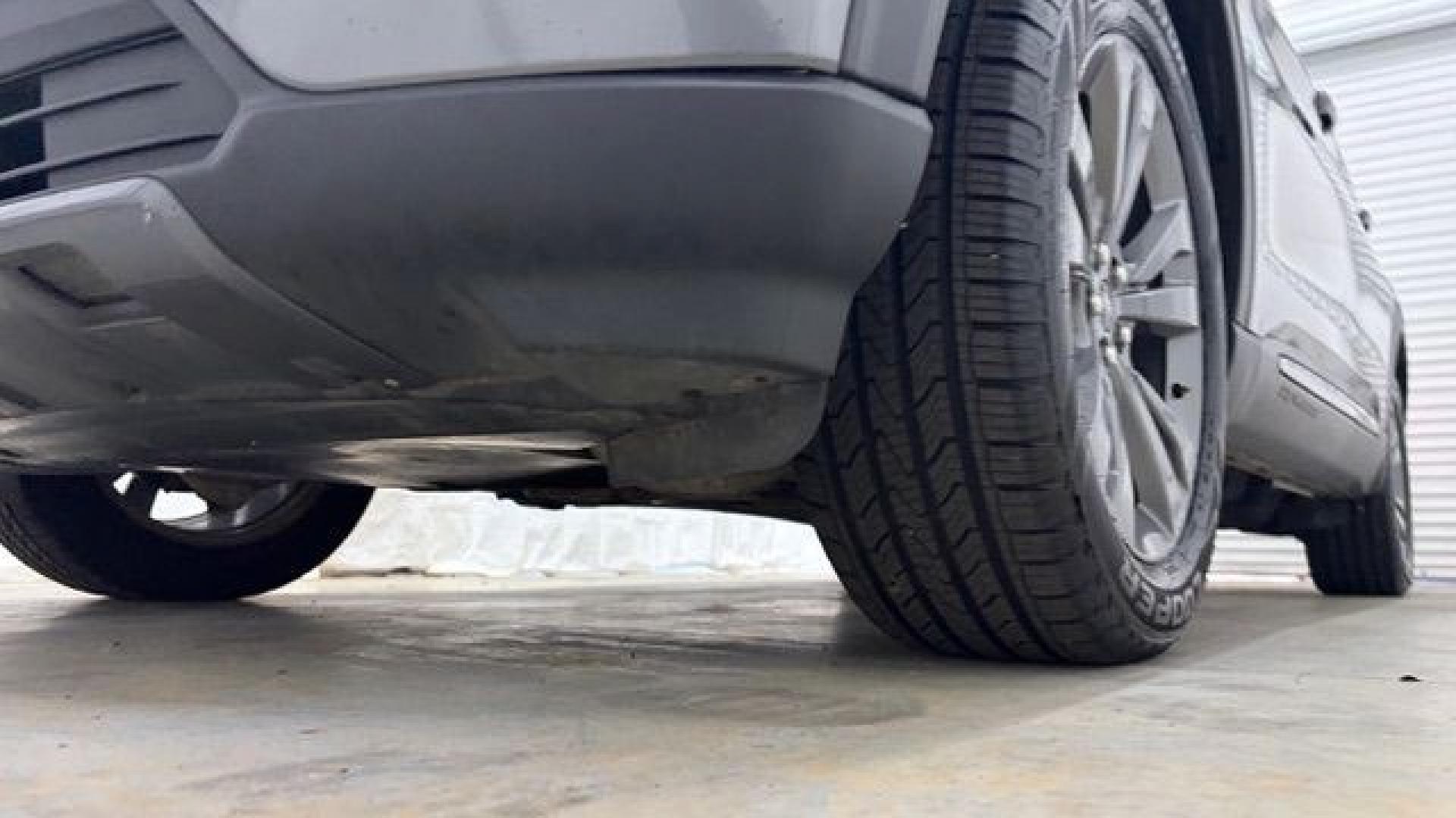 2021 Gray Ford Explorer XLT (1FMSK8DHXMG) with an EcoBoost 2.3L I-4 direct injection engine, located at 1806 Veterans Memorial Hwy SW, Austell, GA, 30168, (770) 944-9558, 33.817959, -84.606987 - This Explorer has an interior that looks good and comes from a non-smoker vehicle. The exterior paint looks excellent, with only minor scratches, and the tires are in great shape. With lots of comfortable seating, it's a spacious, family-friendly SUV that's ready for daily driving.- Photo#22