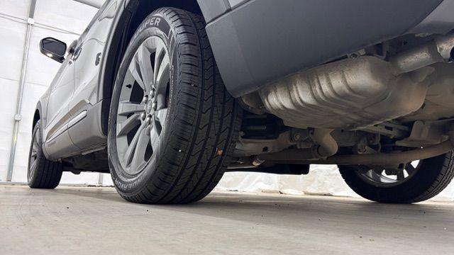 2021 Gray Ford Explorer XLT (1FMSK8DHXMG) with an EcoBoost 2.3L I-4 direct injection engine, located at 1806 Veterans Memorial Hwy SW, Austell, GA, 30168, (770) 944-9558, 33.817959, -84.606987 - This Explorer has an interior that looks good and comes from a non-smoker vehicle. The exterior paint looks excellent, with only minor scratches, and the tires are in great shape. With lots of comfortable seating, it's a spacious, family-friendly SUV that's ready for daily driving.- Photo#23