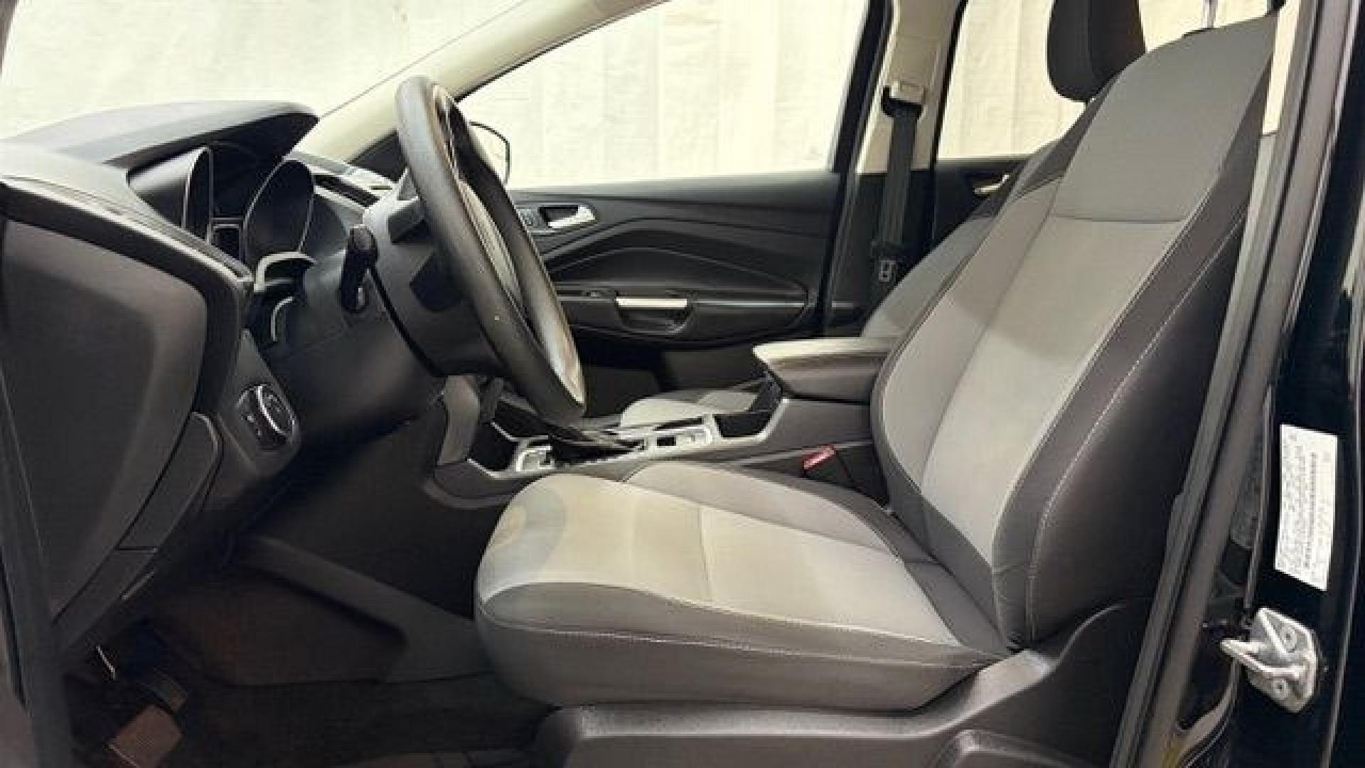 2018 Black Ford Escape SE (1FMCU9GD2JU) with an EcoBoost 1.5L I-4 direct injection engine, located at 1806 Veterans Memorial Hwy SW, Austell, GA, 30168, (770) 944-9558, 33.817959, -84.606987- Photo#10