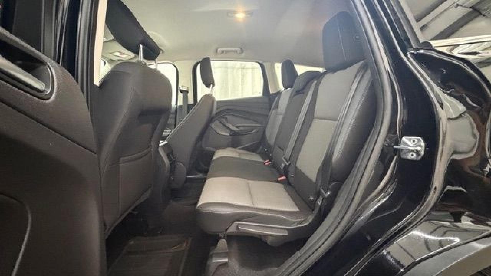 2018 Black Ford Escape SE (1FMCU9GD2JU) with an EcoBoost 1.5L I-4 direct injection engine, located at 1806 Veterans Memorial Hwy SW, Austell, GA, 30168, (770) 944-9558, 33.817959, -84.606987- Photo#13