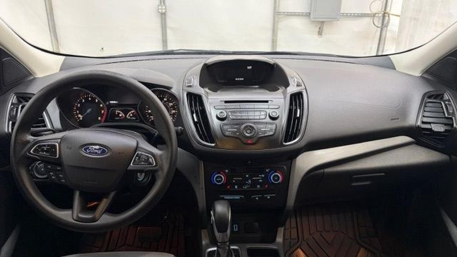 2018 Black Ford Escape SE (1FMCU9GD2JU) with an EcoBoost 1.5L I-4 direct injection engine, located at 1806 Veterans Memorial Hwy SW, Austell, GA, 30168, (770) 944-9558, 33.817959, -84.606987- Photo#14