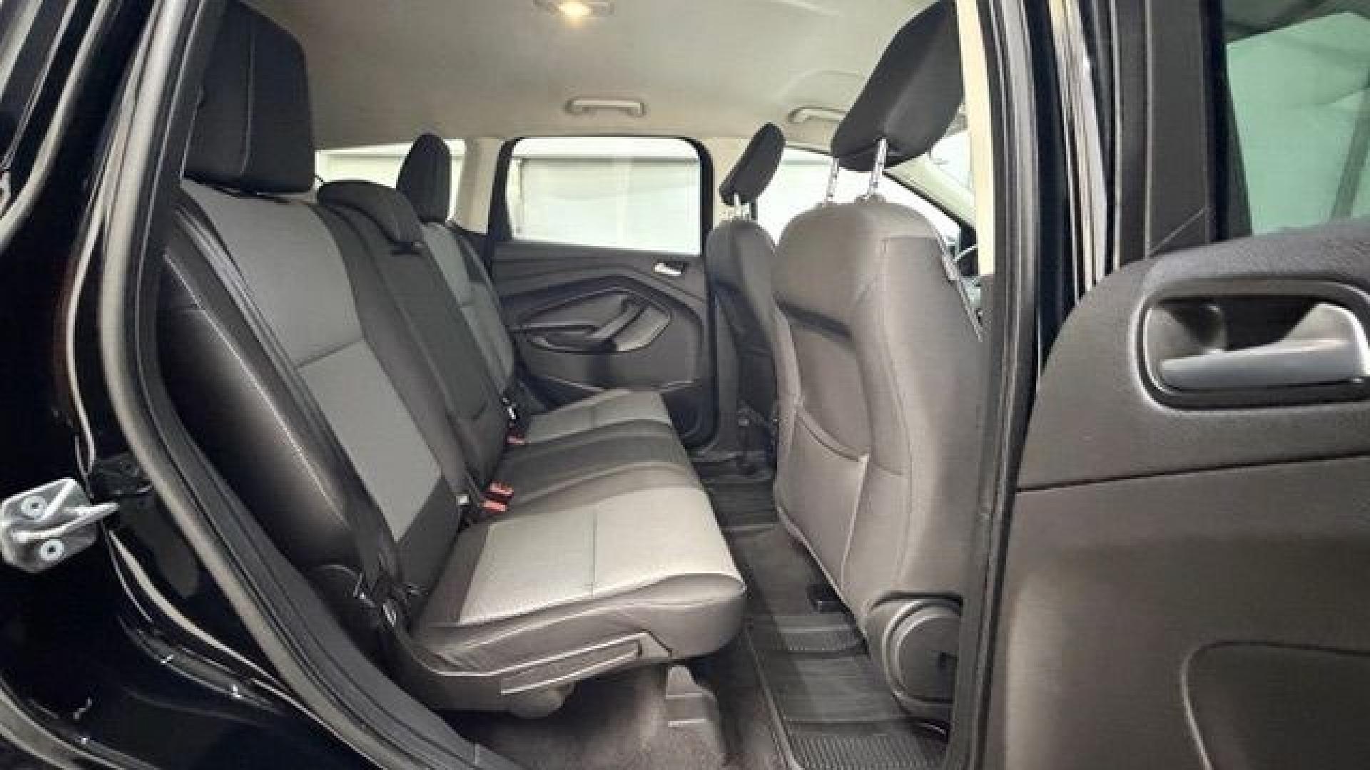 2018 Black Ford Escape SE (1FMCU9GD2JU) with an EcoBoost 1.5L I-4 direct injection engine, located at 1806 Veterans Memorial Hwy SW, Austell, GA, 30168, (770) 944-9558, 33.817959, -84.606987- Photo#16