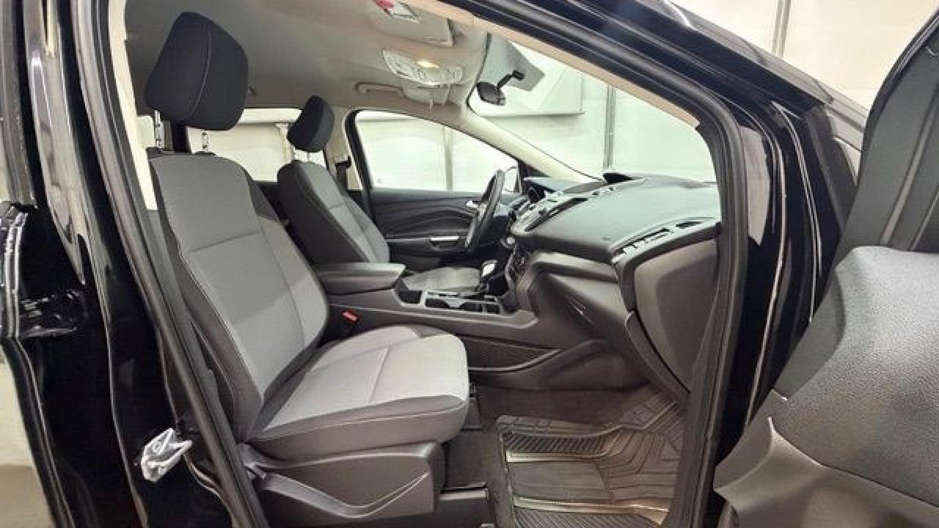 2018 Black Ford Escape SE (1FMCU9GD2JU) with an EcoBoost 1.5L I-4 direct injection engine, located at 1806 Veterans Memorial Hwy SW, Austell, GA, 30168, (770) 944-9558, 33.817959, -84.606987- Photo#17