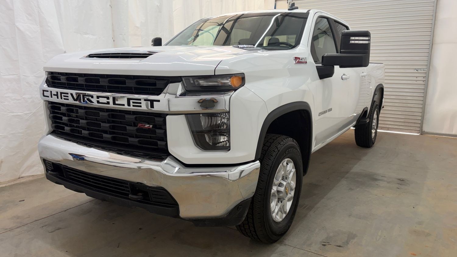 2023 White Chevrolet Silverado 2500HD 4WD Crew Cab Standard Bed LT (2GC1YNEY0P1) with an Duramax 6.6L V-8 direct injection engine, located at 1806 Veterans Memorial Hwy SW, Austell, GA, 30168, (770) 944-9558, 33.817959, -84.606987 - This 2023 Chevrolet Silverado 2500HD Diesel has passed a 100+ point inspection performed in our own service center. It's in super nice shape, especially for a work truck. The paint is very nice, and the interior is super clean for a truck. A strong, capable diesel ready for the job. Come see it in p- Photo#0