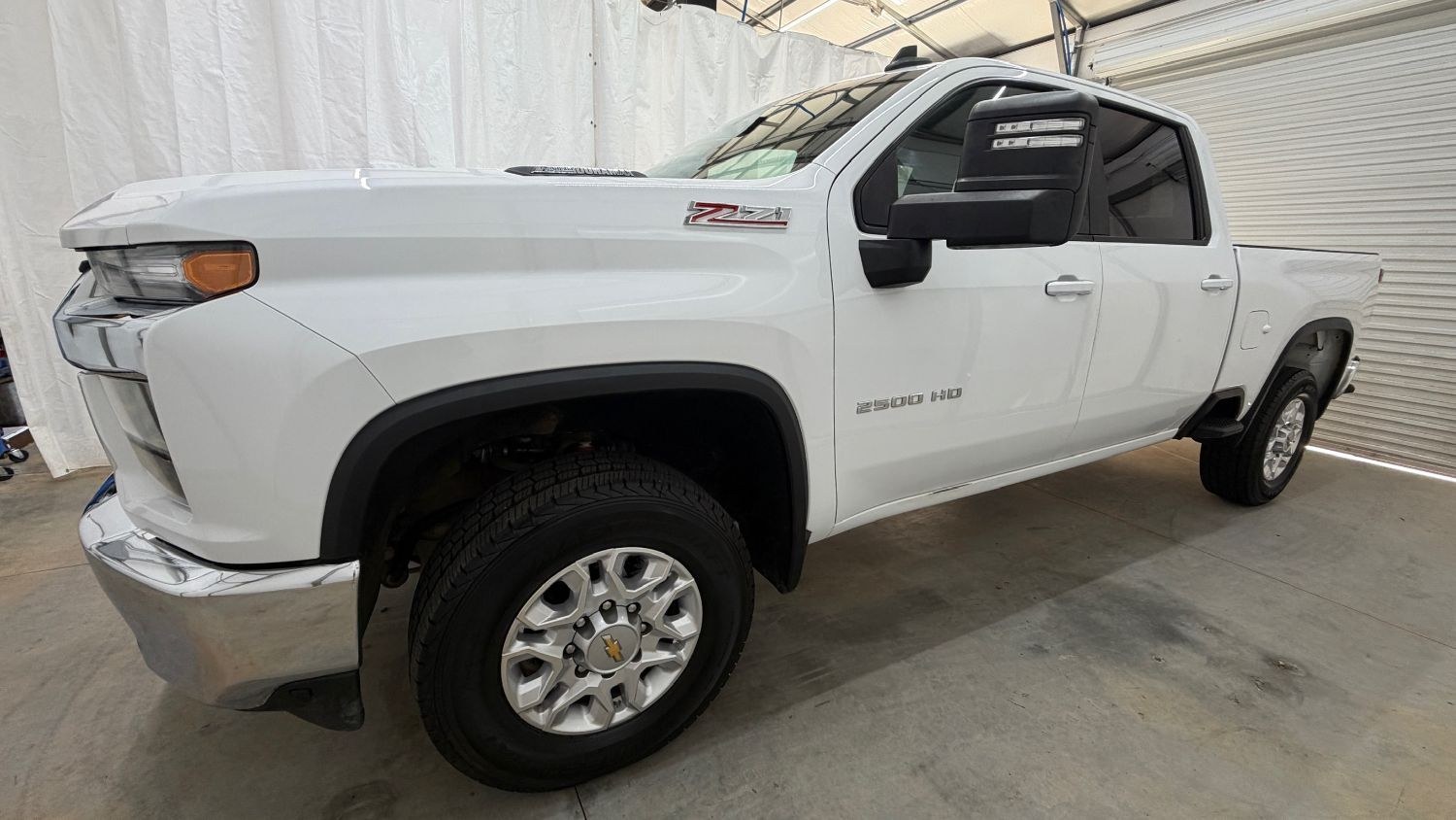 2023 White Chevrolet Silverado 2500HD 4WD Crew Cab Standard Bed LT (2GC1YNEY0P1) with an Duramax 6.6L V-8 direct injection engine, located at 1806 Veterans Memorial Hwy SW, Austell, GA, 30168, (770) 944-9558, 33.817959, -84.606987 - This 2023 Chevrolet Silverado 2500HD Diesel has passed a 100+ point inspection performed in our own service center. It's in super nice shape, especially for a work truck. The paint is very nice, and the interior is super clean for a truck. A strong, capable diesel ready for the job. Come see it in p- Photo#1