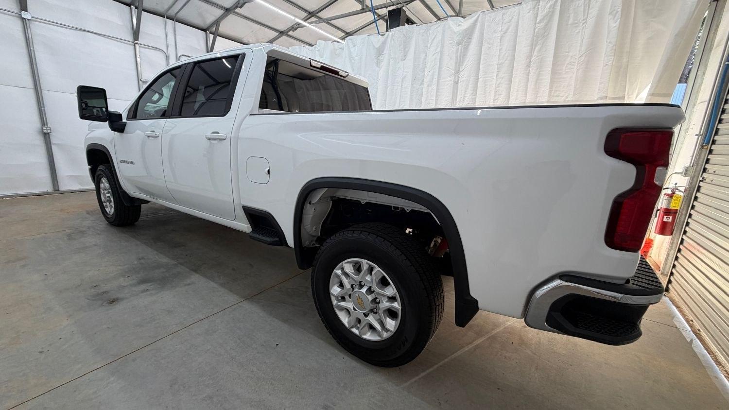 2023 White Chevrolet Silverado 2500HD 4WD Crew Cab Standard Bed LT (2GC1YNEY0P1) with an Duramax 6.6L V-8 direct injection engine, located at 1806 Veterans Memorial Hwy SW, Austell, GA, 30168, (770) 944-9558, 33.817959, -84.606987 - This 2023 Chevrolet Silverado 2500HD Diesel has passed a 100+ point inspection performed in our own service center. It's in super nice shape, especially for a work truck. The paint is very nice, and the interior is super clean for a truck. A strong, capable diesel ready for the job. Come see it in p- Photo#2