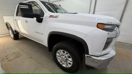 2023 White Chevrolet Silverado 2500HD 4WD Crew Cab Standard Bed LT (2GC1YNEY0P1) with an Duramax 6.6L V-8 direct injection engine, located at 1806 Veterans Memorial Hwy SW, Austell, GA, 30168, (770) 944-9558, 33.817959, -84.606987 - This 2023 Chevrolet Silverado 2500HD Diesel has passed a 100+ point inspection performed in our own service center. It's in super nice shape, especially for a work truck. The paint is very nice, and the interior is super clean for a truck. A strong, capable diesel ready for the job. Come see it in p- Photo#8