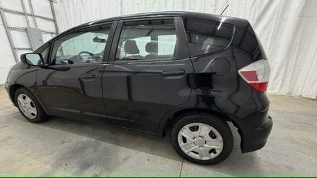 2013 Black /Gray Cloth Interior Honda Fit 5-Speed AT (JHMGE8H35DC) with an 1.5L L4 SOHC 16V engine, 5-Speed Automatic transmission, located at 1806 Veterans Memorial Hwy SW, Austell, GA, 30168, (770) 944-9558, 33.817959, -84.606987- Photo#2