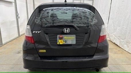 2013 Black /Gray Cloth Interior Honda Fit 5-Speed AT (JHMGE8H35DC) with an 1.5L L4 SOHC 16V engine, 5-Speed Automatic transmission, located at 1806 Veterans Memorial Hwy SW, Austell, GA, 30168, (770) 944-9558, 33.817959, -84.606987- Photo#4