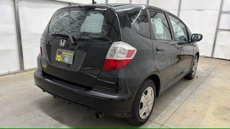 2013 Black /Gray Cloth Interior Honda Fit 5-Speed AT (JHMGE8H35DC) with an 1.5L L4 SOHC 16V engine, 5-Speed Automatic transmission, located at 1806 Veterans Memorial Hwy SW, Austell, GA, 30168, (770) 944-9558, 33.817959, -84.606987- Photo#5
