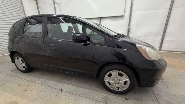 2013 Black /Gray Cloth Interior Honda Fit 5-Speed AT (JHMGE8H35DC) with an 1.5L L4 SOHC 16V engine, 5-Speed Automatic transmission, located at 1806 Veterans Memorial Hwy SW, Austell, GA, 30168, (770) 944-9558, 33.817959, -84.606987- Photo#7