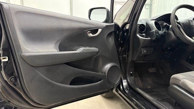 2013 Black /Gray Cloth Interior Honda Fit 5-Speed AT (JHMGE8H35DC) with an 1.5L L4 SOHC 16V engine, 5-Speed Automatic transmission, located at 1806 Veterans Memorial Hwy SW, Austell, GA, 30168, (770) 944-9558, 33.817959, -84.606987- Photo#10