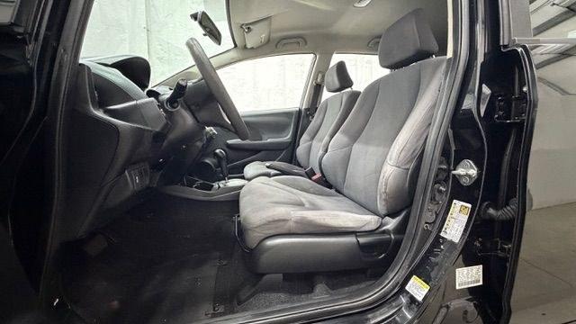 2013 Black /Gray Cloth Interior Honda Fit 5-Speed AT (JHMGE8H35DC) with an 1.5L L4 SOHC 16V engine, 5-Speed Automatic transmission, located at 1806 Veterans Memorial Hwy SW, Austell, GA, 30168, (770) 944-9558, 33.817959, -84.606987- Photo#12
