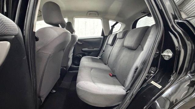 2013 Black /Gray Cloth Interior Honda Fit 5-Speed AT (JHMGE8H35DC) with an 1.5L L4 SOHC 16V engine, 5-Speed Automatic transmission, located at 1806 Veterans Memorial Hwy SW, Austell, GA, 30168, (770) 944-9558, 33.817959, -84.606987- Photo#14
