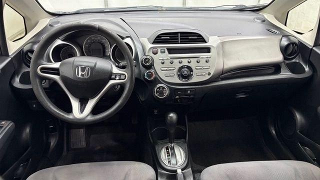 2013 Black /Gray Cloth Interior Honda Fit 5-Speed AT (JHMGE8H35DC) with an 1.5L L4 SOHC 16V engine, 5-Speed Automatic transmission, located at 1806 Veterans Memorial Hwy SW, Austell, GA, 30168, (770) 944-9558, 33.817959, -84.606987- Photo#15