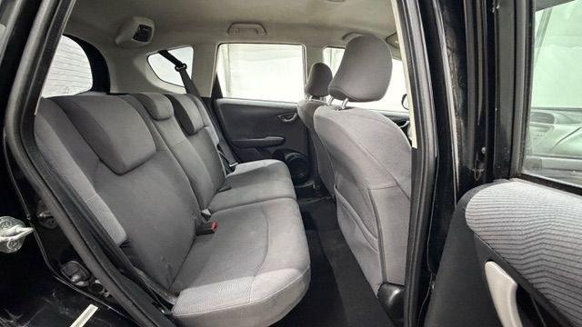 2013 Black /Gray Cloth Interior Honda Fit 5-Speed AT (JHMGE8H35DC) with an 1.5L L4 SOHC 16V engine, 5-Speed Automatic transmission, located at 1806 Veterans Memorial Hwy SW, Austell, GA, 30168, (770) 944-9558, 33.817959, -84.606987- Photo#16