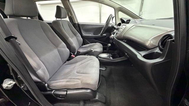 2013 Black /Gray Cloth Interior Honda Fit 5-Speed AT (JHMGE8H35DC) with an 1.5L L4 SOHC 16V engine, 5-Speed Automatic transmission, located at 1806 Veterans Memorial Hwy SW, Austell, GA, 30168, (770) 944-9558, 33.817959, -84.606987- Photo#17
