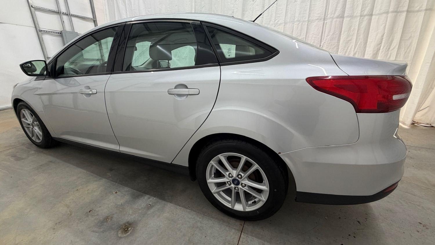 2018 Silver Ford Focus SE (1FADP3F23JL) , located at 1806 Veterans Memorial Hwy SW, Austell, GA, 30168, (770) 944-9558, 33.817959, -84.606987 - This Ford Focus SE has passed a 100+ point inspection performed in our own service center. It's very clean, with no issues to describe and no odors, and the tires are in great condition. Come see it in person and take it for a test drive! Why Choose Automania? At Automania, we make car buying easy- Photo#2