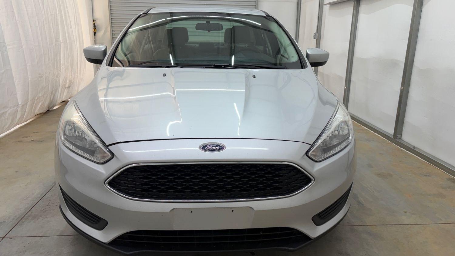 2018 Silver Ford Focus SE (1FADP3F23JL) , located at 1806 Veterans Memorial Hwy SW, Austell, GA, 30168, (770) 944-9558, 33.817959, -84.606987 - This Ford Focus SE has passed a 100+ point inspection performed in our own service center. It's very clean, with no issues to describe and no odors, and the tires are in great condition. Come see it in person and take it for a test drive! Why Choose Automania? At Automania, we make car buying easy- Photo#9
