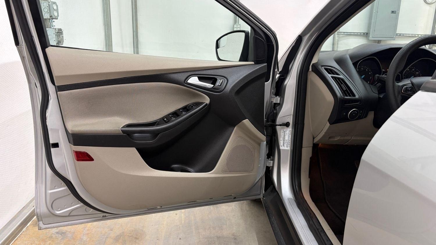 2018 Silver Ford Focus SE (1FADP3F23JL) , located at 1806 Veterans Memorial Hwy SW, Austell, GA, 30168, (770) 944-9558, 33.817959, -84.606987 - This Ford Focus SE has passed a 100+ point inspection performed in our own service center. It's very clean, with no issues to describe and no odors, and the tires are in great condition. Come see it in person and take it for a test drive! Why Choose Automania? At Automania, we make car buying easy- Photo#10
