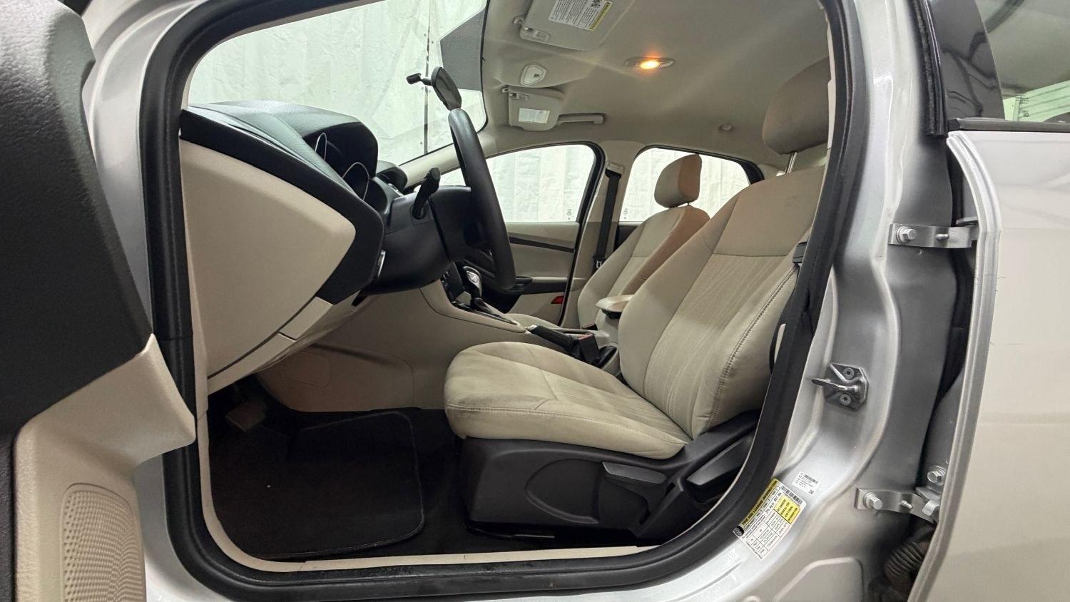 2018 Silver Ford Focus SE (1FADP3F23JL) , located at 1806 Veterans Memorial Hwy SW, Austell, GA, 30168, (770) 944-9558, 33.817959, -84.606987 - This Ford Focus SE has passed a 100+ point inspection performed in our own service center. It's very clean, with no issues to describe and no odors, and the tires are in great condition. Come see it in person and take it for a test drive! Why Choose Automania? At Automania, we make car buying easy- Photo#11