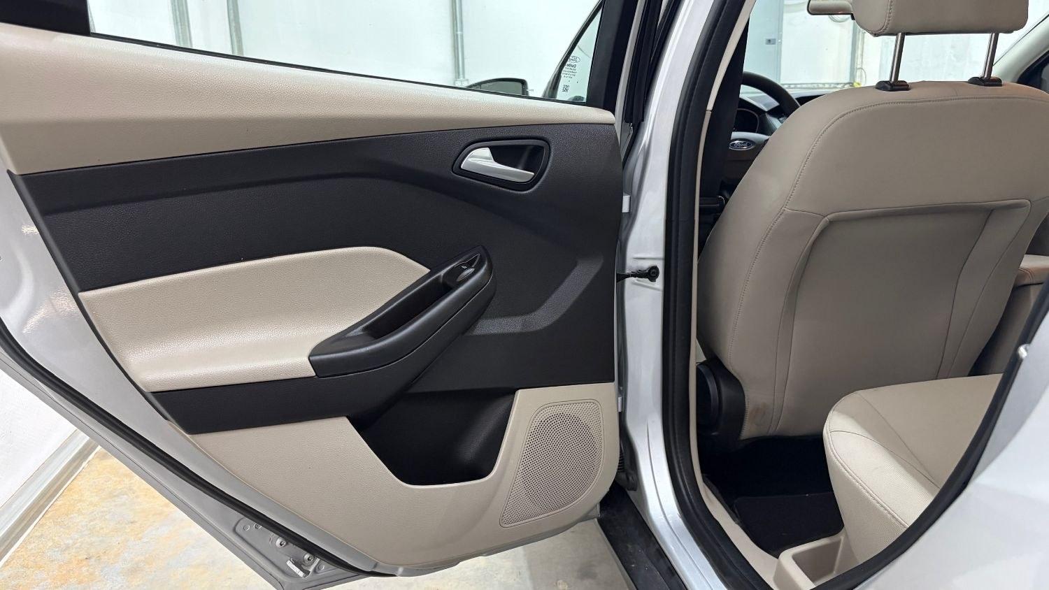 2018 Silver Ford Focus SE (1FADP3F23JL) , located at 1806 Veterans Memorial Hwy SW, Austell, GA, 30168, (770) 944-9558, 33.817959, -84.606987 - This Ford Focus SE has passed a 100+ point inspection performed in our own service center. It's very clean, with no issues to describe and no odors, and the tires are in great condition. Come see it in person and take it for a test drive! Why Choose Automania? At Automania, we make car buying easy- Photo#12