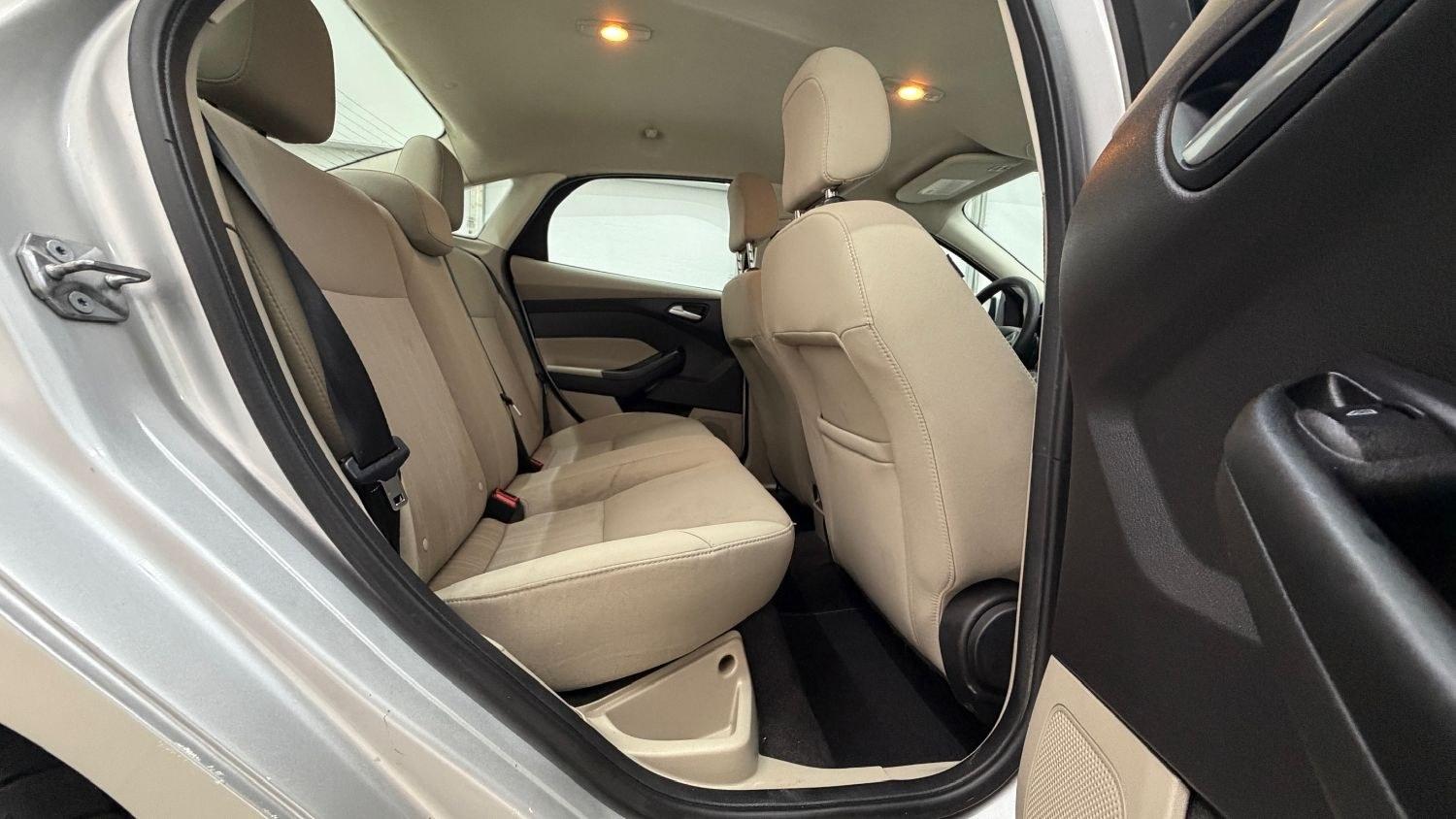 2018 Silver Ford Focus SE (1FADP3F23JL) , located at 1806 Veterans Memorial Hwy SW, Austell, GA, 30168, (770) 944-9558, 33.817959, -84.606987 - This Ford Focus SE has passed a 100+ point inspection performed in our own service center. It's very clean, with no issues to describe and no odors, and the tires are in great condition. Come see it in person and take it for a test drive! Why Choose Automania? At Automania, we make car buying easy- Photo#15